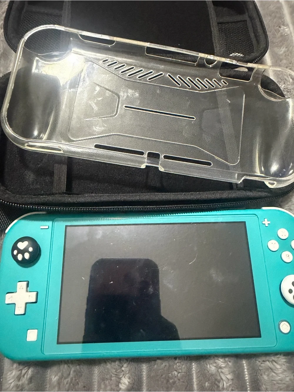 Nintendo Switch Lite Turquoise Handheld Console with Screen On
